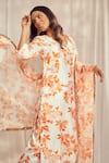 Harshita Singhvi_Orange Tuscan Silk Print Floral V Neck Kurta Pant Set _at_Aza_Fashions