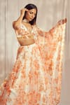 Harshita Singhvi_Orange Tuscan Silk Print French Bloom Plunging V Neck Lehenga Set _at_Aza_Fashions