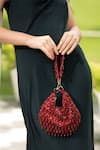 Shop_MODARTA_Red Sequin Embroidered Tasseled Potli Bag _Online_at_Aza_Fashions