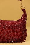 MODARTA_Red Sequin Embroidered Tasseled Potli Bag _at_Aza_Fashions