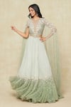 COUTURE BY NIHARIKA_Green Organza Embroidered Vine Closed Neck Cape Blouse And Lehenga Set _at_Aza_Fashions