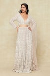 Seema Gujral_Beige Embroidered Floral Plunged V Skirt Set _at_Aza_Fashions