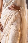 Shop_Seeaash_White Crepe Embroidery Pearls Halter Neck Floral Cutwork Pre-draped Saree Set _Online_at_Aza_Fashions