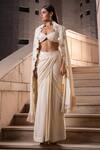 Buy_Seeaash_White Crepe Embroidery Pearls Halter Neck Floral Cutwork Pre-draped Saree Set 