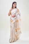 Samyukta Singhania_Off White Saree Tissue Woven Stripe Round With Blouse _Online_at_Aza_Fashions