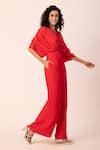 Shop_EWOKE_Red Crepe Embroidered Sequin V-neck Draped Jumpsuit _Online_at_Aza_Fashions