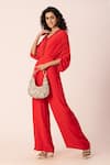 EWOKE_Red Crepe Embroidered Sequin V-neck Draped Jumpsuit _at_Aza_Fashions