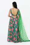 Shop Rishi and Vibhuti Green Crepe, Net Mirrors, Tassels Scoop Neck Jade Floral Print Lehenga Set at Aza Fashions Shop_Rishi and Vibhuti_Green Crepe, Net Mirrors, Tassels Scoop Neck Jade Floral Print Lehenga Set _at_Aza_Fashions