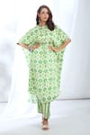 Shop_Gopi Vaid_Green Satin Printed Ikat Band Collar Kaftan Tunic And Pant Set _Online_at_Aza_Fashions