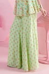 Mandira Wirk_Green Chiffon Printed Floral Boat Neck Nevin Peplum Top Flared Pant Set _Online_at_Aza_Fashions