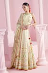 Buy_MANDIRA WIRK - Indian_Ivory Chanderi Printed Blossom Halter Neck Safir Lehenga Set _at_Aza_Fashions