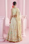 Shop_MANDIRA WIRK - Indian_Ivory Chanderi Printed Blossom Halter Neck Safir Lehenga Set _at_Aza_Fashions