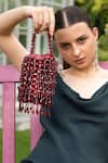 Shop_MODARTA_Maroon Bead Embellished Wristlet Bag _at_Aza_Fashions