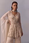 Kalista_Off White Blouse Viscose Silk Embroidered Mariam High-low Tiered Sharara Set _at_Aza_Fashions