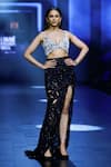 Ritika Mirchandani_Black Net Obsidian Cutwork Trail Skirt With Bloom Bustier _Online_at_Aza_Fashions