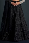 Ritika Mirchandani_Black Crepe Embroidered Crystal Plunging Selene Cascade Lehenga Set _Online_at_Aza_Fashions