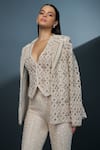 Buy_Ritika Mirchandani_Ivory Crepe Embellished Crystal Blazer Lapel Illume Cutwork Mesh Sharara Set _Online_at_Aza_Fashions