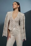 Shop_Ritika Mirchandani_Ivory Crepe Embellished Crystal Blazer Lapel Illume Cutwork Mesh Sharara Set _Online_at_Aza_Fashions