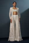 Buy_Ritika Mirchandani_Ivory Crepe Embellished Crystal Coat Lapel Zephyra Cutwork Trench Sharara Set _at_Aza_Fashions