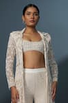 Buy_Ritika Mirchandani_Ivory Crepe Embellished Crystal Coat Lapel Zephyra Cutwork Trench Sharara Set _Online_at_Aza_Fashions