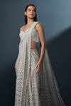 Ritika Mirchandani_Ivory Crepe Astriona Cutwork Jaali Pre-draped Saree With Applique Blouse _Online_at_Aza_Fashions