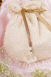 Shop_SWABHIMANN_White Embroidery, Beads Broken Stripe Potli _Online_at_Aza_Fashions