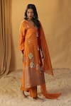 Buy_arpita sulakshana_Orange Chanderi Hand Paint Floral V-neck Silk Kurta And Pant Set 