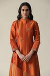 Shop_arpita sulakshana_Orange Raw Silk Embellished Sequin Mandarin Collar Asymmetric Tunic _Online_at_Aza_Fashions