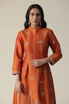 arpita sulakshana_Orange Raw Silk Embellished Sequin Mandarin Collar Asymmetric Tunic _at_Aza_Fashions