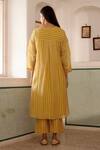 Shop_Vaayu_Yellow Cotton Muslin Printed Linear Round Kurta And Pant Set _at_Aza_Fashions