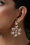 Buy_Paisley Pop_Red Kundan Floral Embellished Studs _at_Aza_Fashions