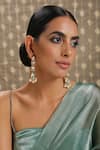 Paisley Pop_Gold Plated Kundan Tear Drop Carved Earrings _at_Aza_Fashions