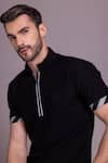 Buy_AMIT ARORA_Black Cotton Knit Collared Half Sleeve T-shirt _Online_at_Aza_Fashions