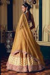 Shop_Aditi Gupta_Yellow Silk Organza Jacquard Banarasi Embroidered Asymmetric Bridal Lehenga Set _Online_at_Aza_Fashions