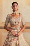 Aditi Gupta_Ivory Silk Jacquard Banarasi Zardosi Embroidered Asymmetrical Lehenga Set _Online_at_Aza_Fashions