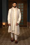 Buy_DESIGN O STITCH_Ivory Suiting Embroidery Heritage City Pintuck Pattern Sherwani Pant Set _at_Aza_Fashions