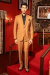 Buy_DESIGN O STITCH_Brown Suiting Placement Embroidery Bird Motif Tuxedo With Pant _at_Aza_Fashions