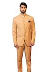 DESIGN O STITCH_Beige Suiting Embellished Lion Face Buttons Bandhgala With Pant _at_Aza_Fashions