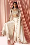 Buy_Pankaj & Nidhi_Ivory Brocade And Silk Organza Charisma Scallop Embroidered Cape Sharara Set _Online_at_Aza_Fashions