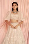 Pankaj & Nidhi_Beige Tulle And Silk Organza thea Encrusted Lehenga With Puff Sleeve Blouse _Online_at_Aza_Fashions