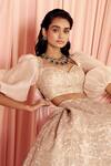 Shop_Pankaj & Nidhi_Beige Tulle And Silk Organza thea Encrusted Lehenga With Puff Sleeve Blouse _Online_at_Aza_Fashions