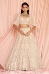 Buy_Pankaj & Nidhi_Beige Tulle And Silk Organza thea Encrusted Lehenga With Puff Sleeve Blouse _at_Aza_Fashions