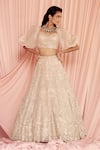 Shop_Pankaj & Nidhi_Beige Tulle And Silk Organza thea Encrusted Lehenga With Puff Sleeve Blouse _at_Aza_Fashions