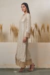 Buy_Akanksha Mago_Ivory Georgette Embroidered Zari Round High Low Tassel Dress _Online_at_Aza_Fashions