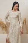 Shop_Akanksha Mago_Ivory Georgette Embroidered Zari Round High Low Tassel Dress _at_Aza_Fashions