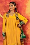 PRAHNAAYA_Yellow Vegan Satin Embroidery Luna Sequin Asymmetric Kurta With Dhoti Pant _Online_at_Aza_Fashions