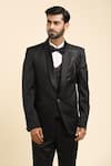 Aryavir Malhotra_Black Suiting Placement Embroidery Abstract Wave Tonal Tuxedo And Trouser Set _at_Aza_Fashions