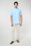 Shop_Arihant Rai Sinha_Blue Linen Solid Band Collar Short Kurta _at_Aza_Fashions