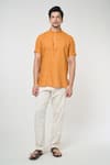 Buy_Arihant Rai Sinha_Orange Linen Solid Mandarin Collar Short Kurta _at_Aza_Fashions