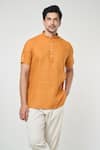 Shop_Arihant Rai Sinha_Orange Linen Solid Mandarin Collar Short Kurta _Online_at_Aza_Fashions